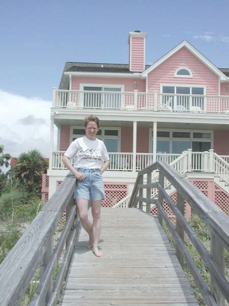 07sueinfrontofcottage