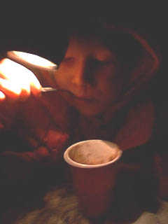 Mary drinking hot chocolate